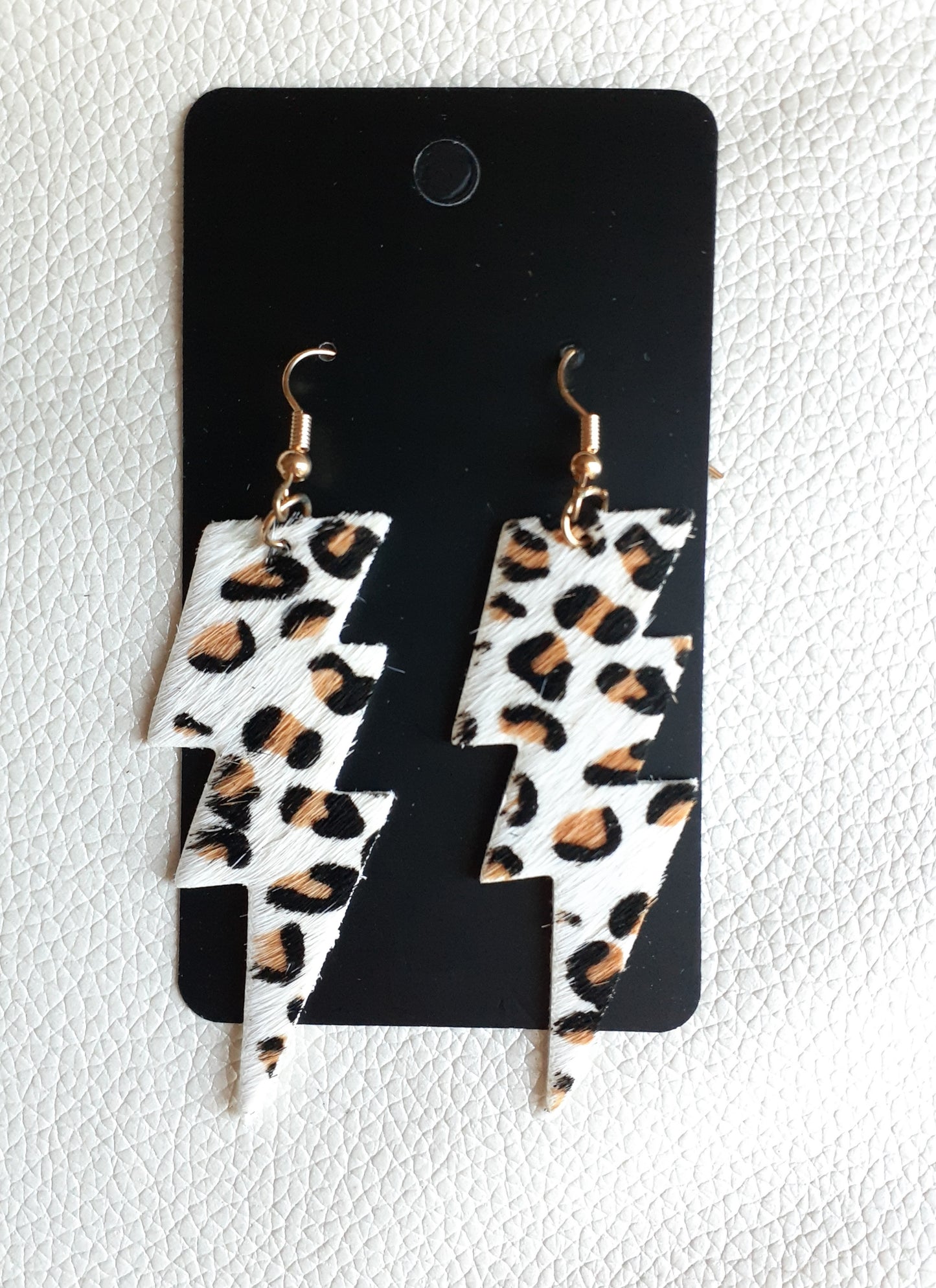 White + Leopard Lightning Bolt Drops