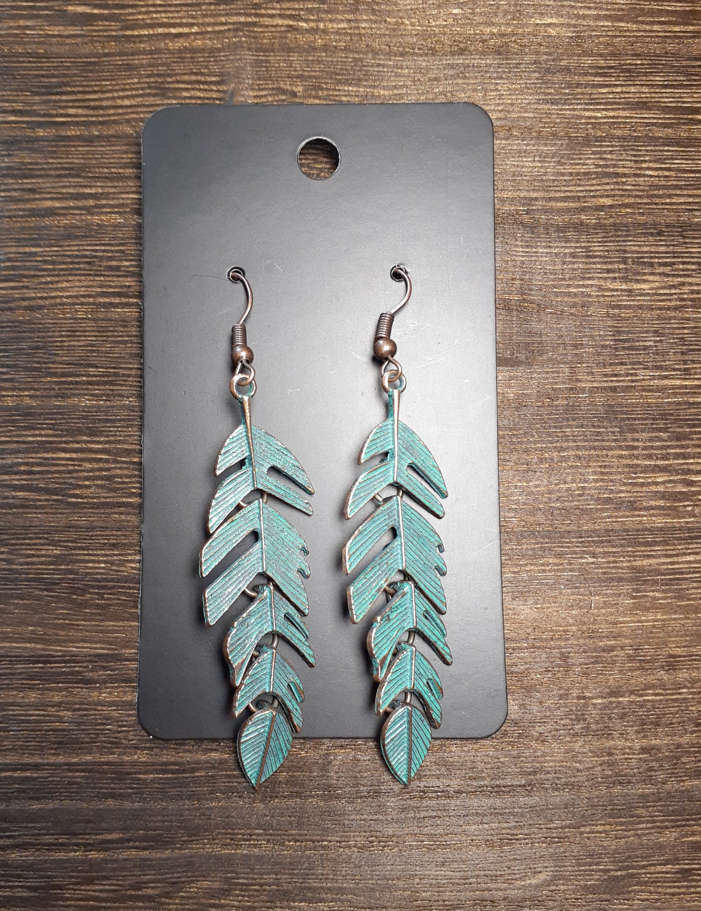 Feather Dangle Linked Metal Earrings